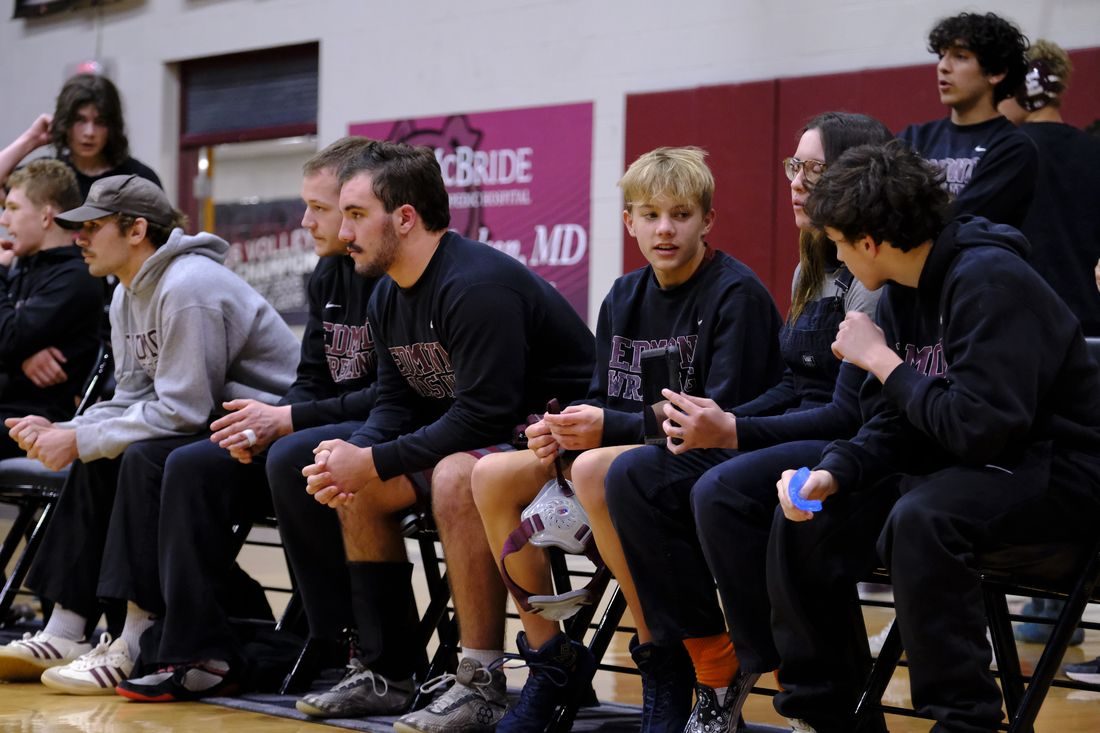 Edmond Memorial wrestler competing